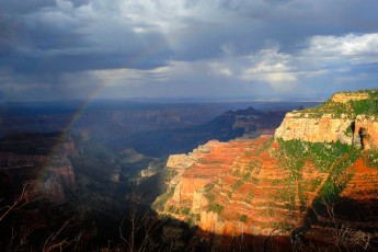 Rainbow and rain over the North Rim of the Grand Canyon