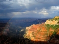 Rainbow and rain over the North Rim of the Grand Canyon